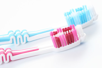 two toothbrushes isolated on white background