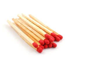 Some red matches isolated on a white background.