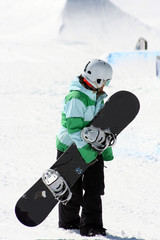 Snowboarder Girl Holding Board