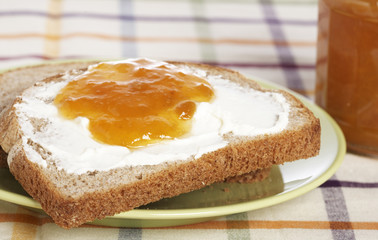 Toast with jam with soft shadow on background. Shallow DOF