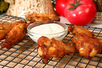 Chicken wings AKA buffalo wings and ranch dressing.