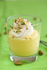 Delicious mango mousse topped with whipped cream