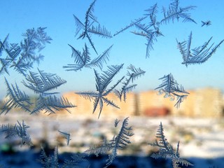 Winter patterns on the windows glass