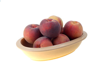 Fresh peaches on white background