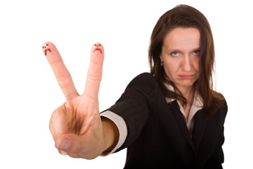 depressed businesswoman presenting fingers with sad faces drawn