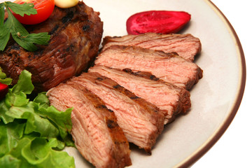 grilled meat steak on color dish