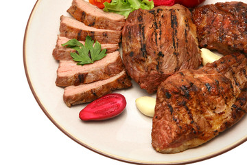 served roasted beef meat steak on color dish