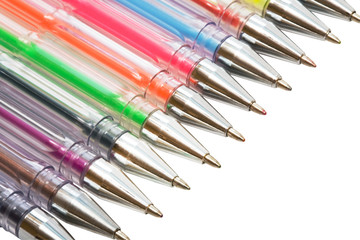 Fototapeta premium Color ballpoint pens on a white background