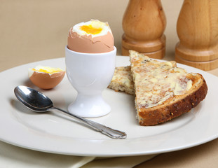 Soft boiled egg with buttered toast