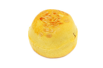 A yellow Shanghai moon cake isolated on white background.