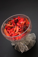 Red potpourri in crystal bowl