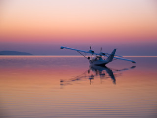 Seaplane at Sunset on lake