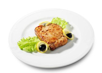 Fish Steak Served with Salad Leaves Isolated on White Background