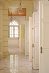 pillar, lamp, corridor with door and window..