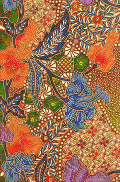 Fototapeta Batik sarong with orange and blue floral motif