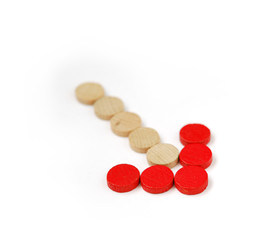 Arrow symbol made from wooden chips