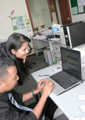 business people working in office with laptop