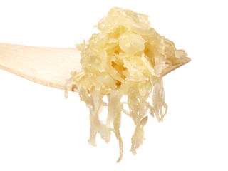 Sauerkraut auf einem Holzlöffel