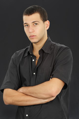 young caucasian man, black background