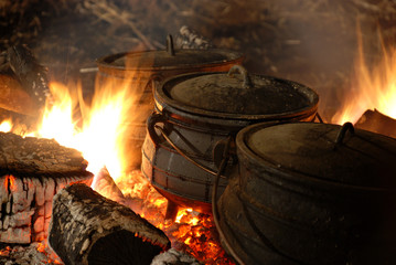 hot cauldron on a fire - 9493969