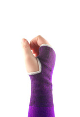 sprained wrist wrapped in a elastic cloth for support