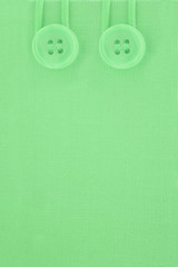 green tarp like background  with buttons on top