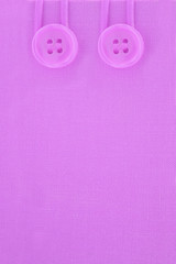 purple tarp like background  with buttons on top