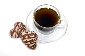 cup with coffee and cookies