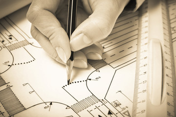 Hand drawing road plan. Sepia tone. Shallow DOF..