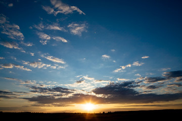 Colorful sunset with cloudscapes as background. Space for text..