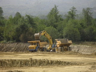 Obraz premium Coal mine machines in work in field