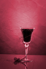 red wine glass against classic background