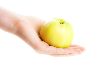 Hand with a green apple