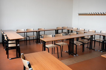 Empty classroom with chairs and tables