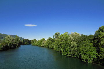 Fototapeta na wymiar River in a summer sunny day with clear blue sky
