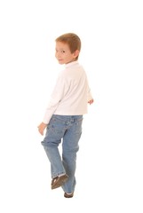 Portrait of a young boy walking away