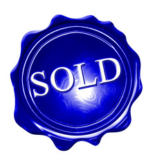 blue wax seal with sold written on it