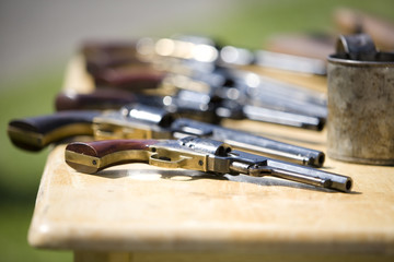 A table with Civil War era revolvers.