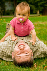 Father and daughter in garden