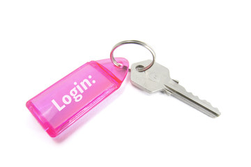 Key with Login Key Ring on White Background
