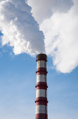 Smoke billowing from tall stacks