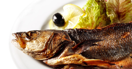Fish Baked in Spicy Served with Salad Leaves