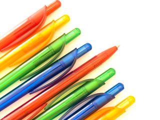 row of the multicolored ballpoint pens