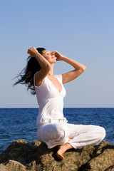 younger woman relax on the beach