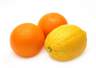 Bright, ripe fruit - oranges and lemon. Object over white