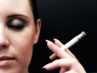 Half woman face with closed eye and cigarette