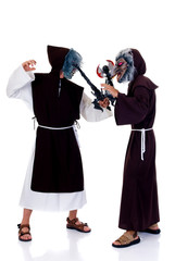 Holiday scene, two Halloween characters,  priests in habit