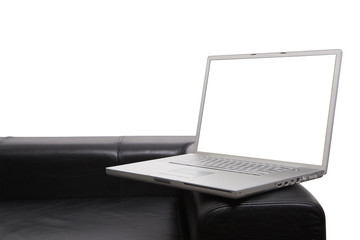 Laptop on couch isolated with clipping paths