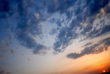 evening sky of  coming sun in steppe, spring