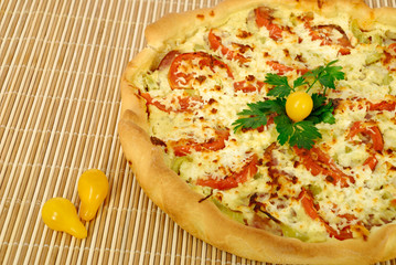 The whole pizza of house preparation on a mat